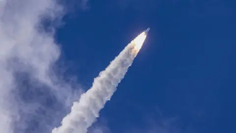 AFP Ariane 6 rocket blasting off from its launch pad at the Guiana Space Centre in Kourou, French Guiana, 9 July 2024.