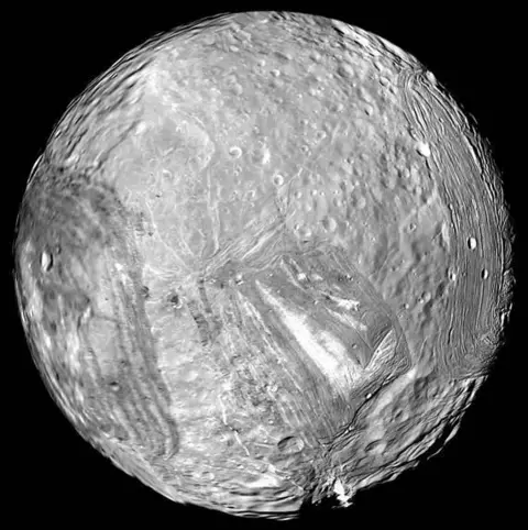 NASA Black and White picture of Miranda, one of the moons of Uranus.