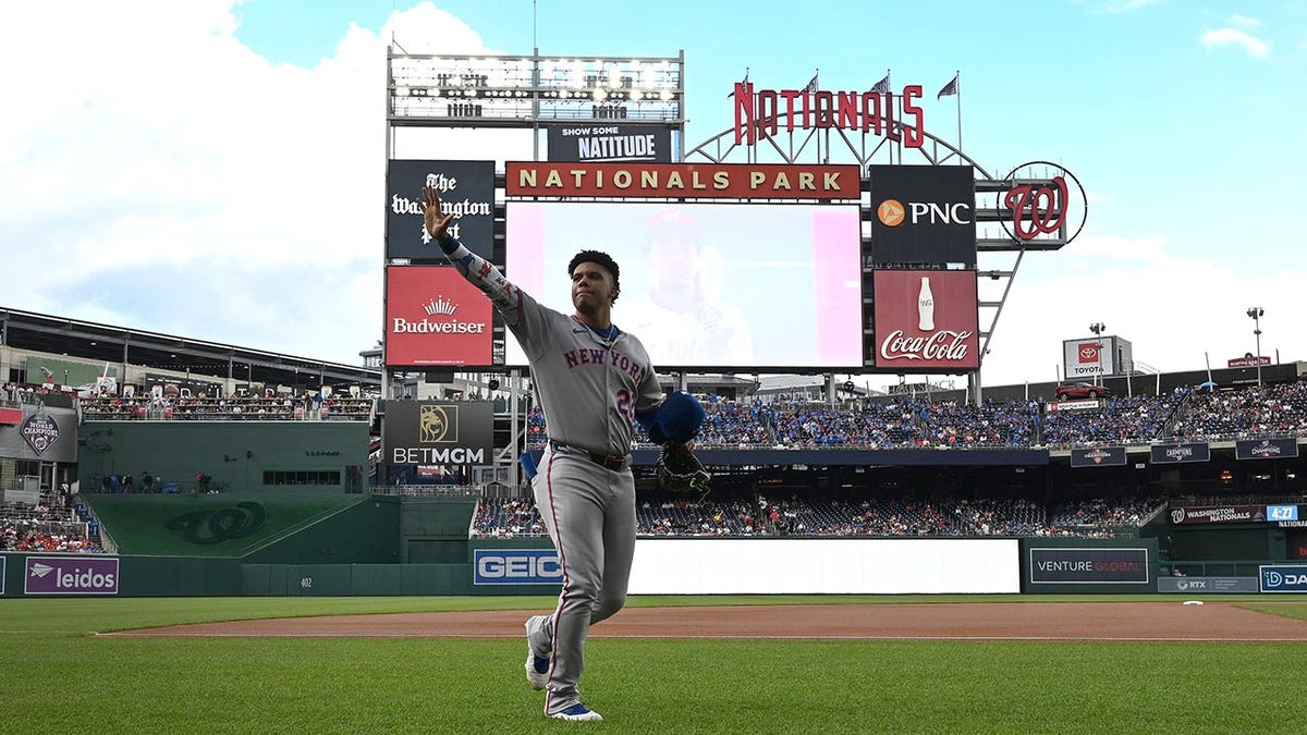 Juan Soto waves