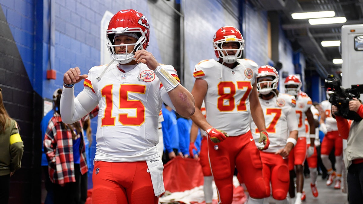 Patrick Mahomes leads the team to the field